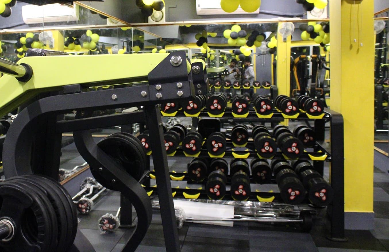 Gym interiror with various fitness equipment